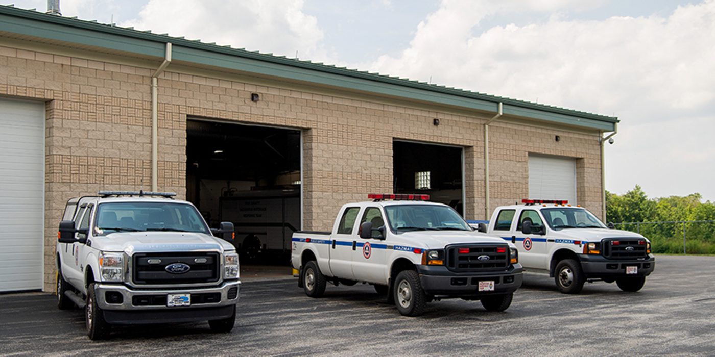 Emergency response vehicles parked outside the Erie County Department of Public Safety
