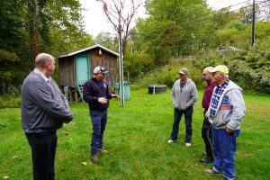 County Executive discussing topics among project members.